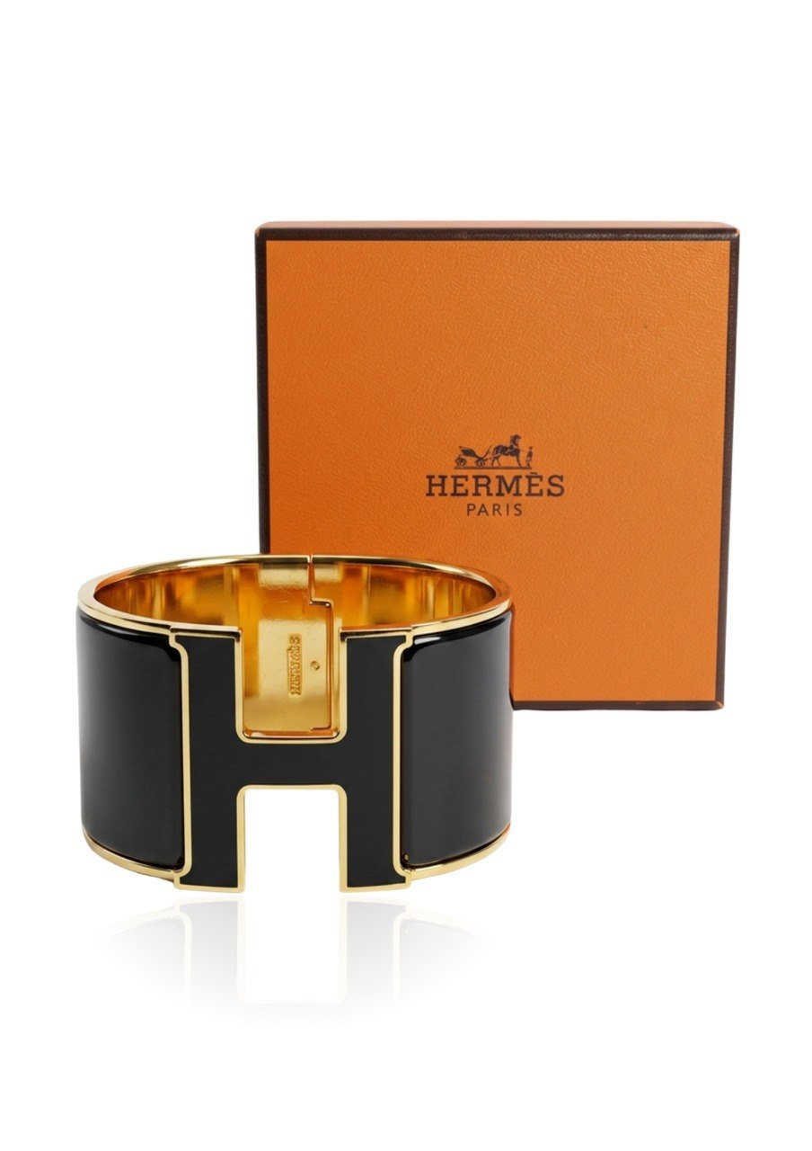 HERMES CLIC CLAC H BANGLE FEATURING BLACK ENAMEL AND GOLD PLATED HARDWARE (EC00106LEBG)