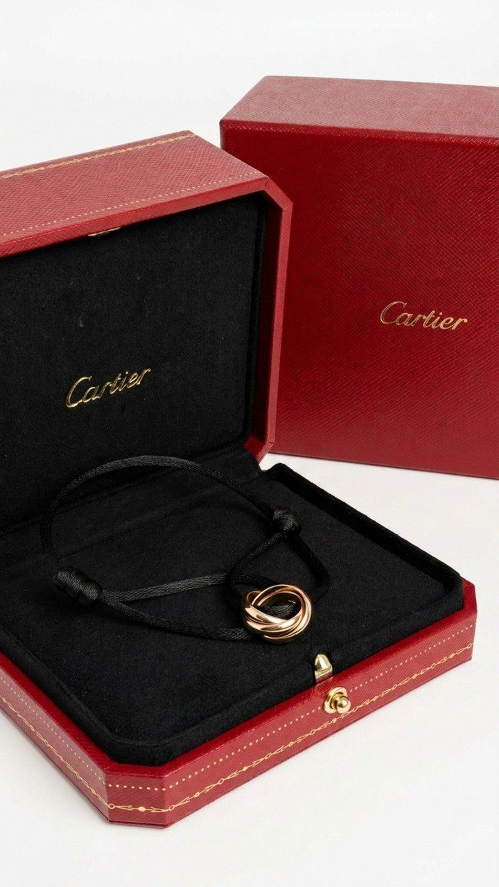 CARTIER TRINITY CORD BRACELET WITH ADJUSTABLE BLACK FABRIC BAND (EC00123YGB)